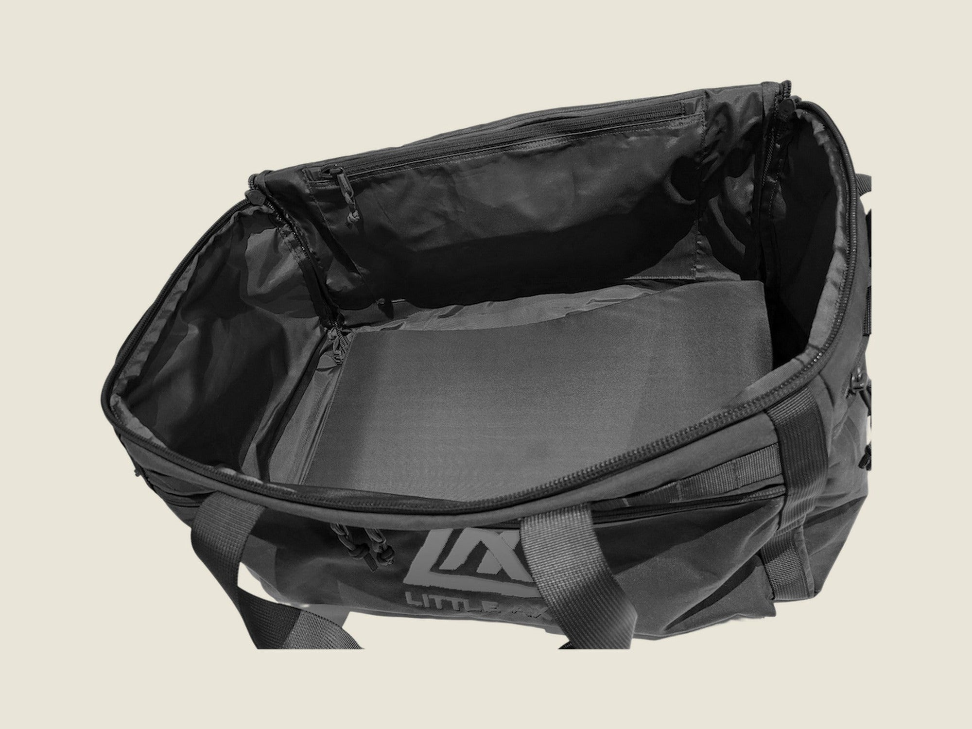 LT1 Light Traveller Duffle Bag in black, open showing the main compartment