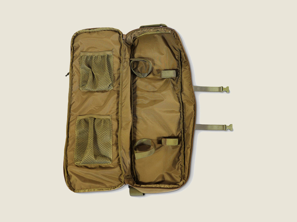 R2C compact bow case, open showing bow retention straps and mesh pockets